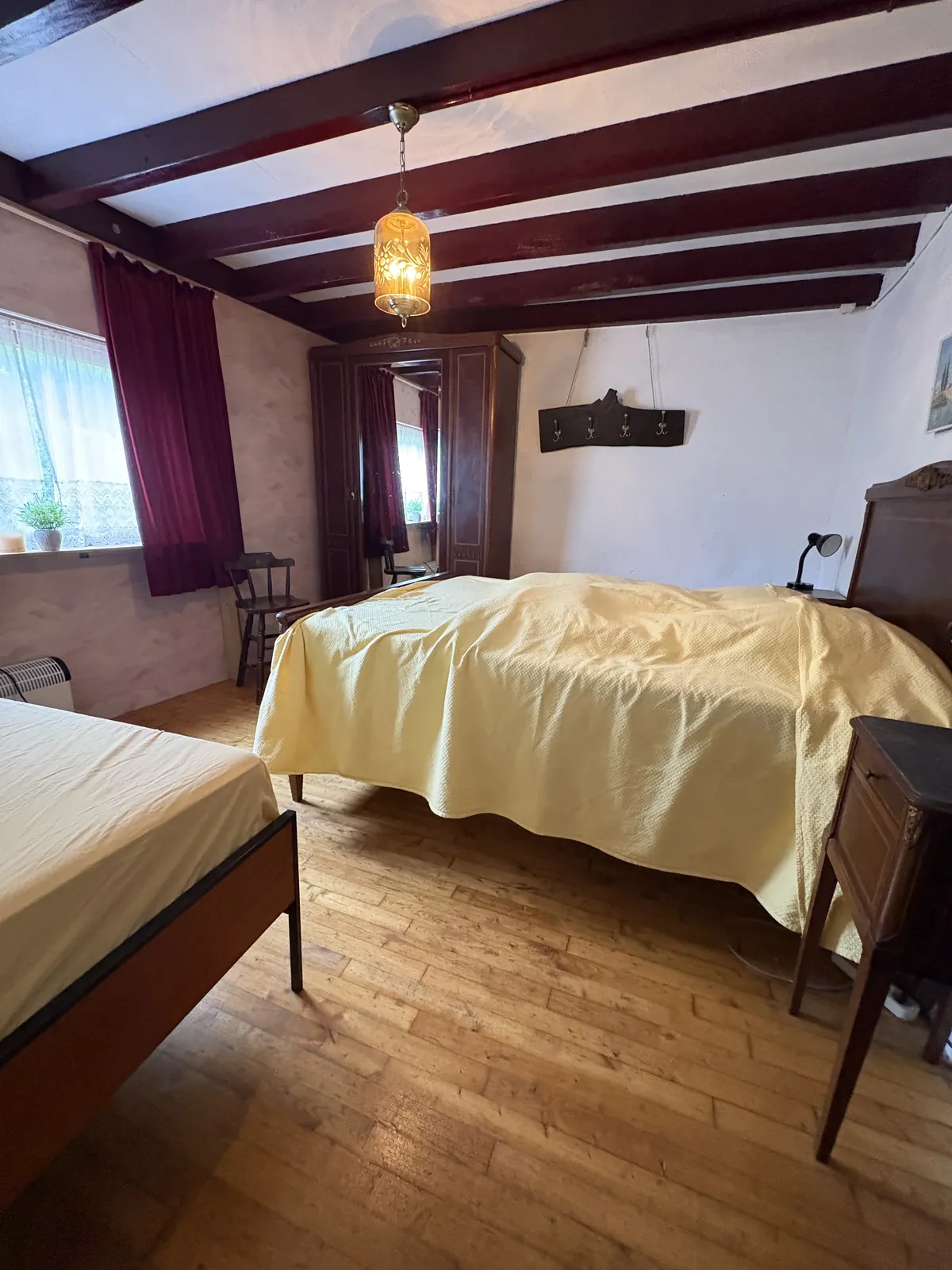Bedroom with wooden beams